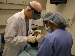 Dr. Bernstein and technician in surgery